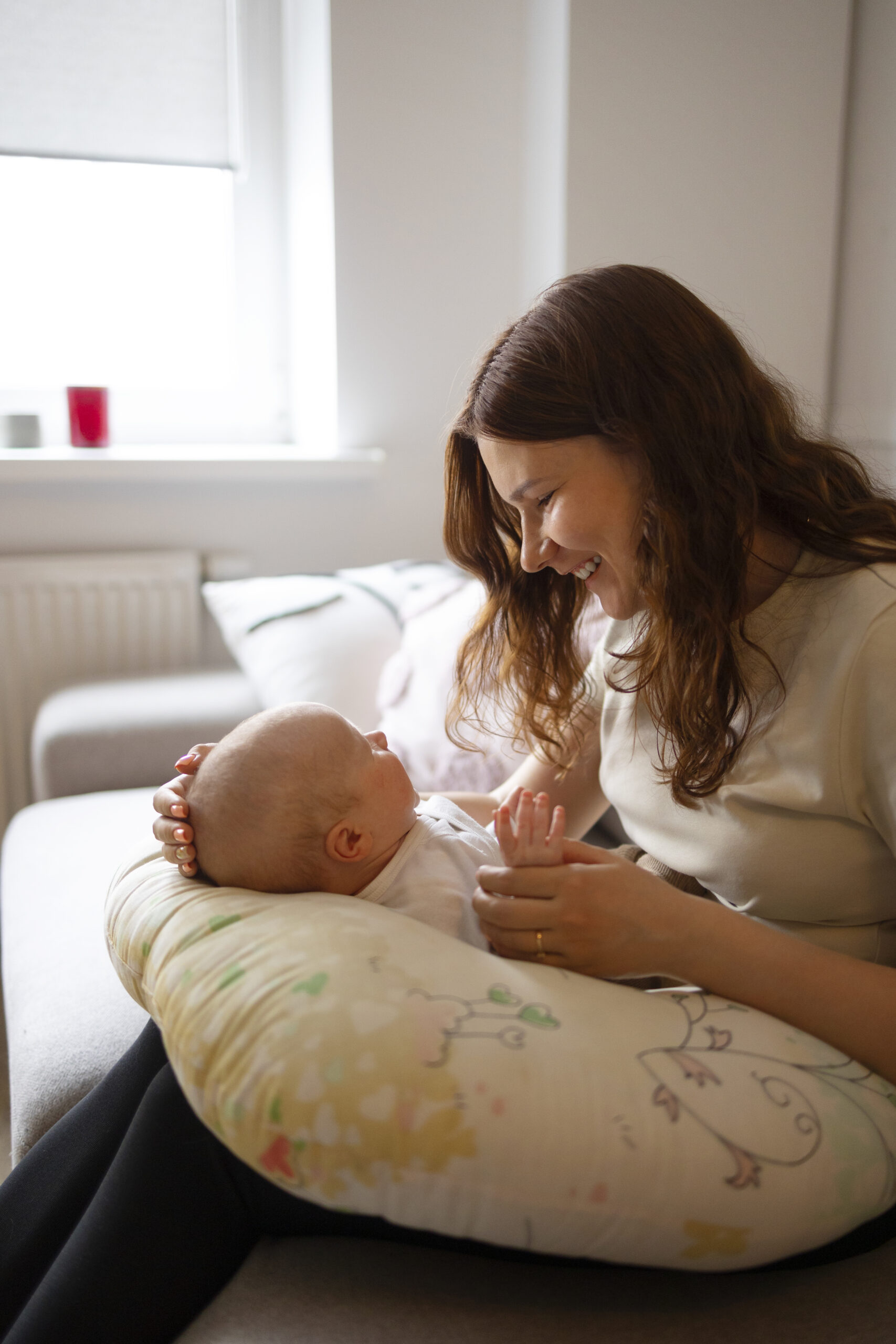 side-view-mother-with-baby-home